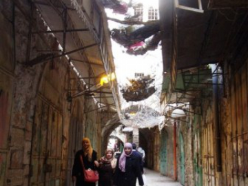 Settler violence is extremely common within Hebron. Many settlers live in houses and apartments that tower over Palestinian properties and use this vantage point to terrorise those below.